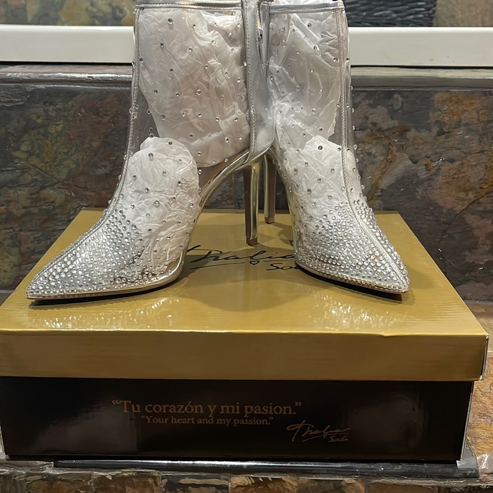 Brand new clear and silver boots, size 7.5